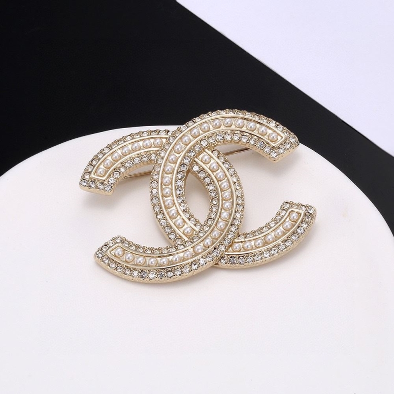 Ch**el brooches